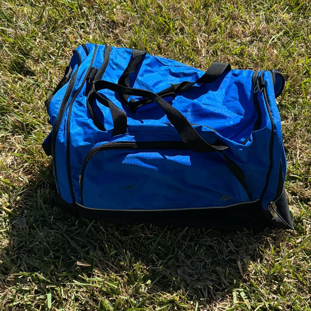 Russell Athletic Blue and Black Sports bag
Multiple compartments